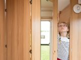 The narrow wardrobe in the Bailey Pursuit 560-5 offers little full-height hanging space, say Practical Caravan's expert reviewers