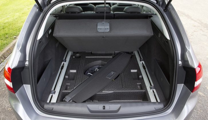The 308 SW's luggage cover can be stowed under the boot floor when not being used, which is a very useful feature