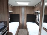 The fixed twin beds and new, modern looking wood trim inside the Swift Elegance 565
