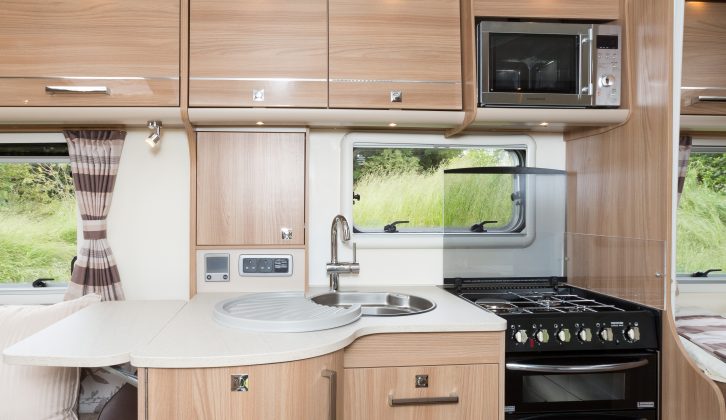 The fold-out worktop in the kitchen helps increase food preparation space in  the Bailey Unicorn Cadiz