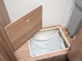 There's a laundry basket in the base of the wardrobe in the Unicorn Cadiz's washroom