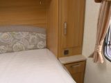 Wardrobes and drawers below them flank the island bed of the Coachman VIP 545/4, Practical Caravan reviewers say