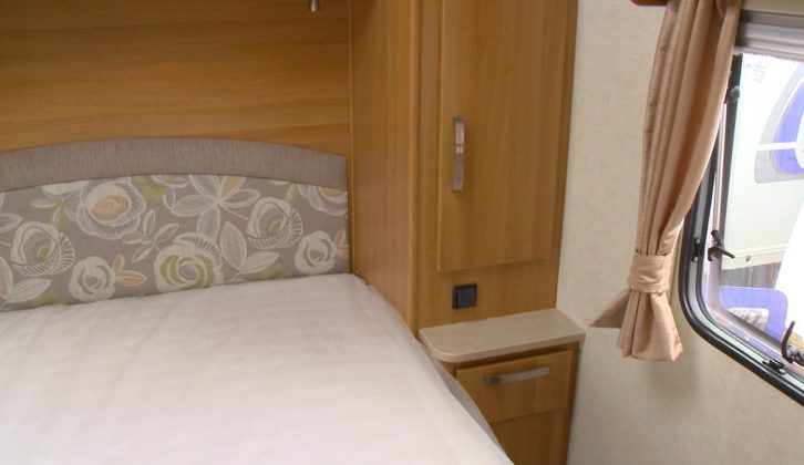 Wardrobes and drawers below them flank the island bed of the Coachman VIP 545/4, Practical Caravan reviewers say