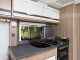 There's a smart and modern feel to the kitchen in this two-berth Pastiche that should please fans of Coachman caravans