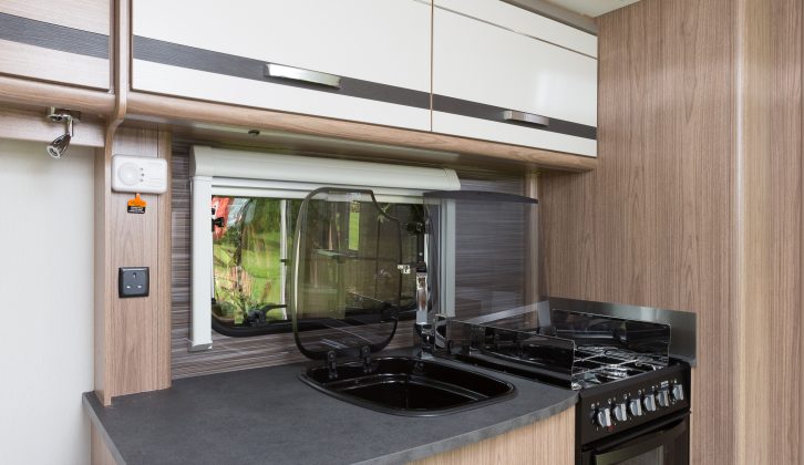 There's a smart and modern feel to the kitchen in this two-berth Pastiche that should please fans of Coachman caravans