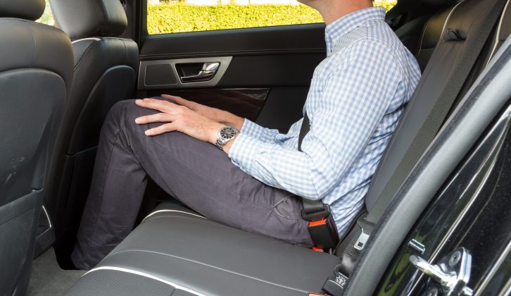 Three can fit in the rear seat of the Jaguar XF Sportbrake, but the transmission tunnel makes it better suited to two, while leg and headroom are limited, say Practical Caravan's testers