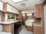 Dark wood, cream cupboards and worktop, plus grey upholstery give the Venus 540/4 a more upmarket and contemporary feel, say Practical Caravan's reviewers