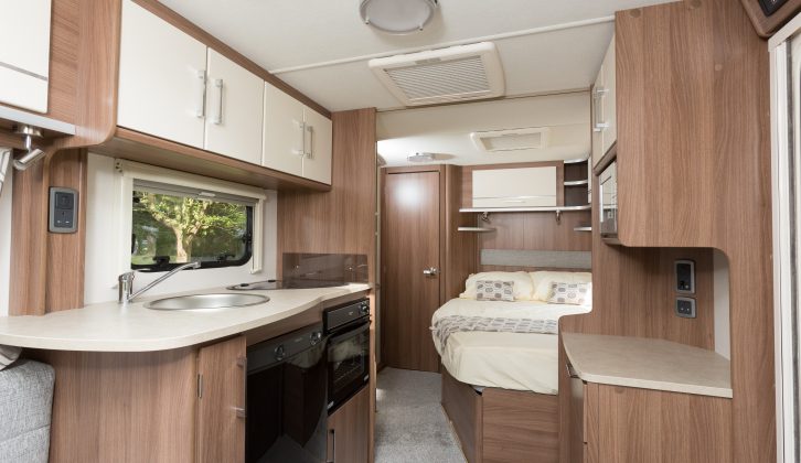 Dark wood, cream cupboards and worktop, plus grey upholstery give the Venus 540/4 a more upmarket and contemporary feel, say Practical Caravan's reviewers