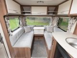 Silvery strips on the shelves and overhead locker doors, and grey seating, contribute to the more upmarket appearance of the Venus 540/4, report Practical Caravan's reviewers