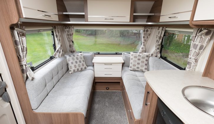 Silvery strips on the shelves and overhead locker doors, and grey seating, contribute to the more upmarket appearance of the Venus 540/4, report Practical Caravan's reviewers