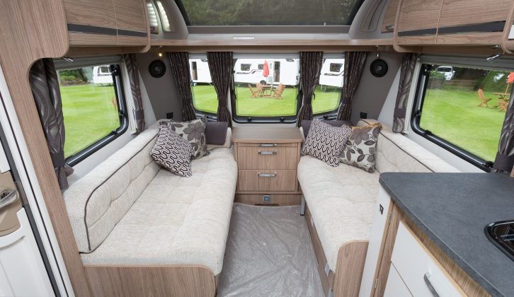 The matt-finish wallboard, upholstery and flooring of the Coachman VIP 575/4 look contemporary, while generous glazing and a large sunroof make the lounge light