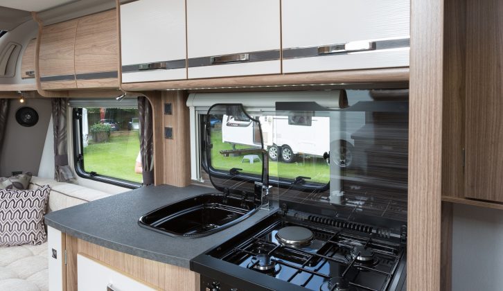 Even the draining board is a designer item, but the kitchen of the Coachman VIP 575/4 is not style over substance – there's plenty of kit, worktop and clever storage space