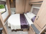 The Coachman VIP 575/4's transverse island bed, the first in this range, can be retracted during the day to ease access to the end washroom, and has a three-layer mattress