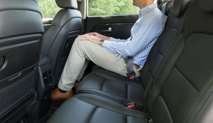 The second row of seats provides passengers with ample leg and headroom, air vents, wide entrances and fold-out tables