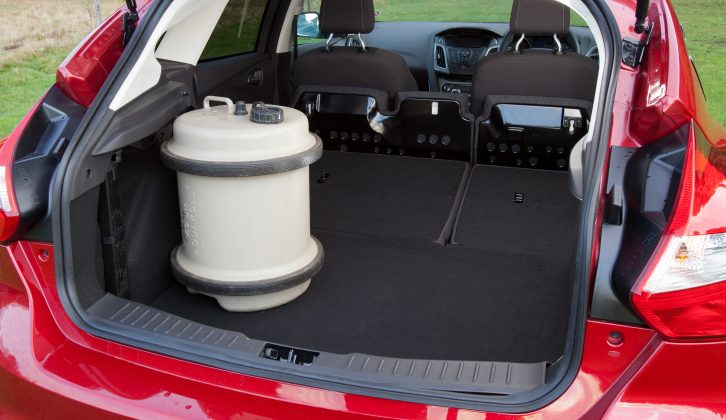 The rear seats of the Ford Focus do not lie flat, but there is no step in the floor to get in the way of loading long objects