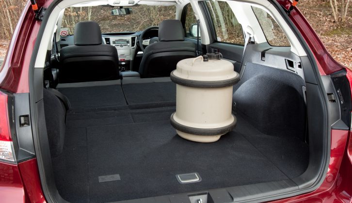 The Subaru Outback's rear seat bench folds down easily with levers at either end, to create an enormous loading area