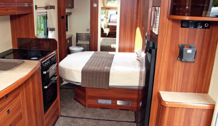 The island bed in the Buccaneer Cruiser is actually fixed – it does need to be slid in during the day to permit easy access to the end washroom