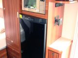 The microwave oven comes as standard and is fitted for safe use at chest height, just above the large fridge/freezer in the 2015 Buccaneer Cruiser