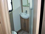 The corner washroom of the Lunar Quasar 586 is very well appointed and occupies two-thirds of the caravan's width