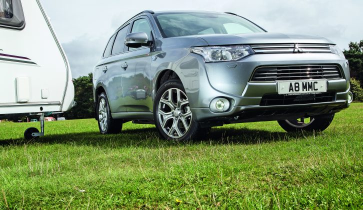Mitsubishi's great Outlander has a hybrid version and this month we give it our full tow car test
