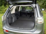 To extend the load space in the Mitsubishi Outlander PHEV, you must first tip the seat bases forward, but the seats do lie flat