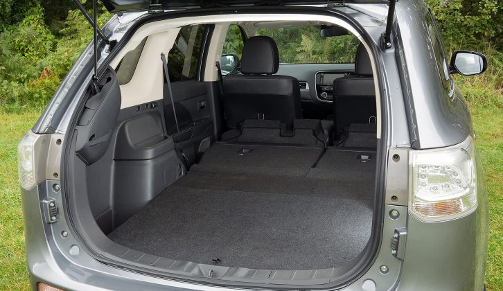 To extend the load space in the Mitsubishi Outlander PHEV, you must first tip the seat bases forward, but the seats do lie flat