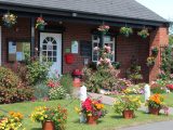 Chester Fairoaks Caravan Club Site's wardens dazzled judges to win first prize in 2014's Sites in Bloom awards, and the Alan Payne Trophy