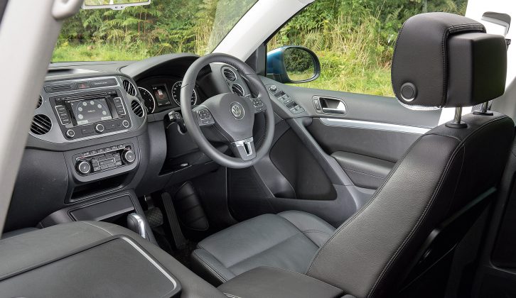 There’s a handy tray for sunglasses above the centre of the dashboard, while additional controls for the stereo, phone and trip computer are mounted on the VW Tiguan's steering wheel