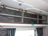 The roof lockers above the side dinette are shelved in the award-winning Sterling Eccles Sport 524 caravan