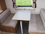 The dinette is wider in the 2015 Compass Rallye 530 caravan than in other caravans