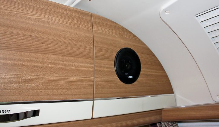 Speakers are cleverly mounted in the curved locker in the lounge in the 2015 Compass Rallye 530