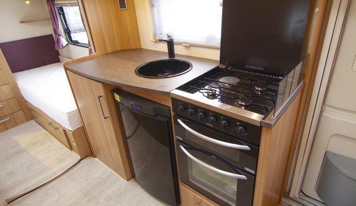 The Lunar Lexon 590 kitchen is opposite the washroom, in the central heart of the caravan