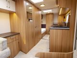 By placing the washroom opposite the kitchen Lunar has created a coridor to the bedroom in the Lexon 590 caravan for 2015