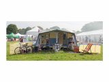 Nic's vintage caravan art gallery makes an impressive and attractive stand at shows