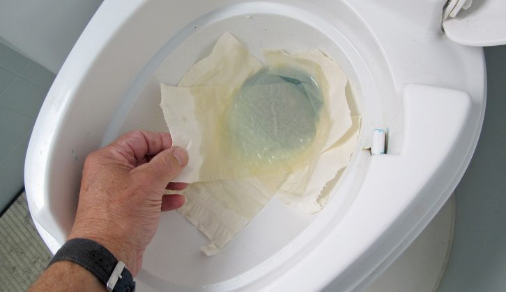 Line the bowl with a few pieces of toilet paper floating on a little flushing water if you have to do more than a pee in the caravan loo