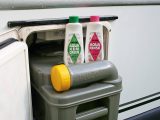 Camping accessories shops sell specialist toilet fluids for caravans and there are plenty to choose from – some liquid; some crystals; some kinder to the environment than others
