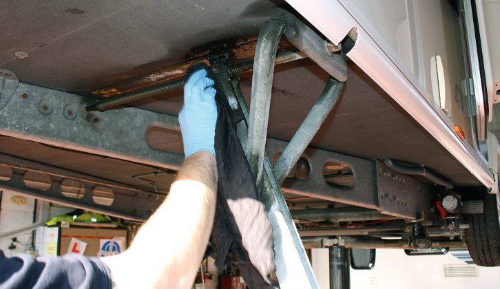 Get under the van to clean each steady with brake cleaner spray
