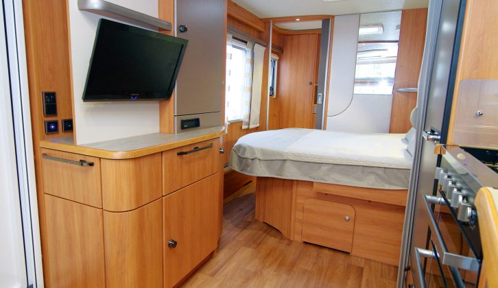 The dresser opposite the kitchen houses the flatscreen TV and CD/radio, plus sockets and USB point in the Hymer Nova GL 590, reviewed by Practical Caravan