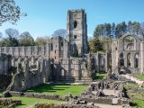 Visit the romantic ruins of the 12th century Fountains Abbey, set in a medieval deer park, during your caravan holidays in Yorkshire