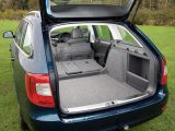 Fold the seats flat to reveal the Škoda Superb Estate's full 1865-litre boot