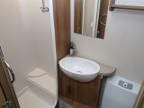 The central washroom has a fully lined separate shower in the six-berth Swift Freestyle SE S 6 TD