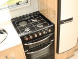 Every appliance you’ll need is here in the kitchen area in the 2015 Bailey Unicorn Madrid, but the microwave’s location above the hob is not ideal