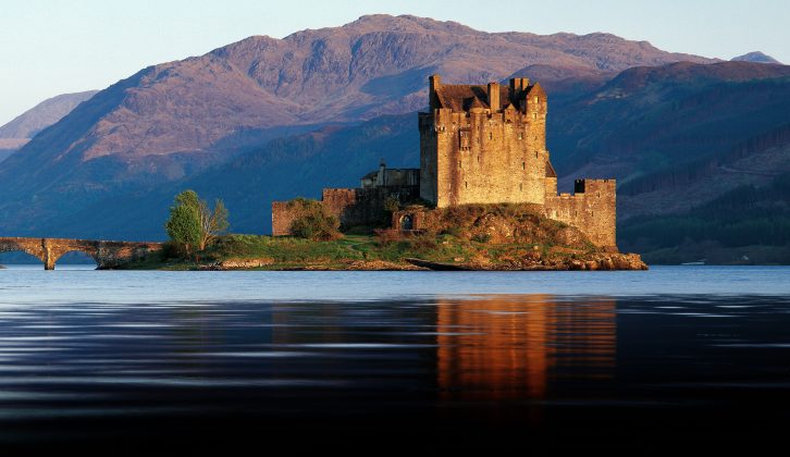 When you visit the Isle of Skye during your caravan holidays in Scotland, looking across Loch Duich to Eilean Donan Castle, pictured here with Skye and Lochalsh in the background