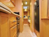 The bedroom can be closed off from the 
rest of the van with solid doors that meet across the gangway in this luxury caravan