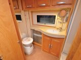Luxury features abound in the spacious rear washroom in the Vanmaster V640 TB caravan