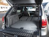 Fold the BMW X5's seats down and the boot floor isn't quite flat, but it is 185cm long, giving a 1870-litre capacity