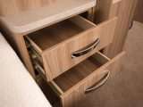 The kitchen has plenty of storage, including these drawers