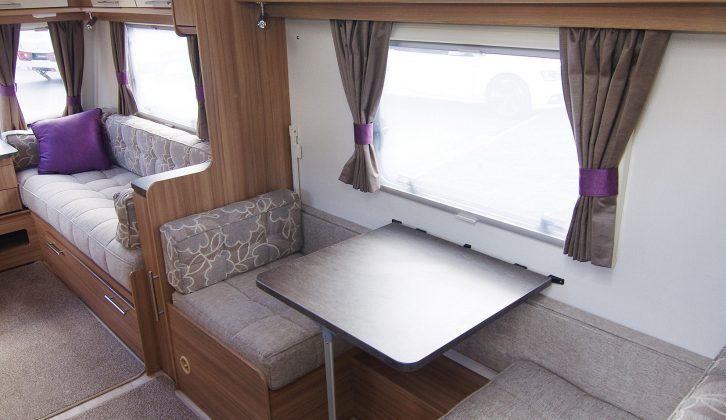 Children love having a side dinette in the family caravan and quickly turn it into their play area for games or drawing