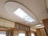 A long rooflight sheds light into the lounge by day, and at night there is lighting in the pelmet and corner pods, plus spotlights for reading