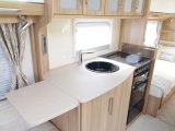The kitchen is a bright, airy space with an additional worktop flap and ample cupboards in the Lunar Delta TS launched in 2015